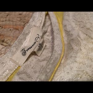 yellow and white lace croptop